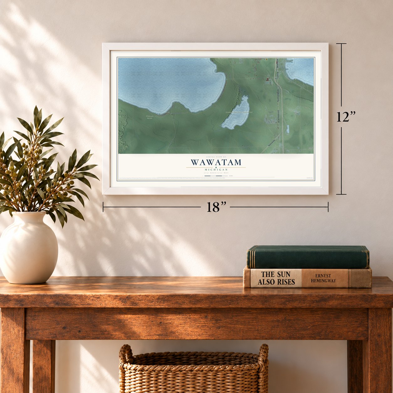 Wawatam, Michigan map, 12 x 18 inch print in a white frame in an entryway