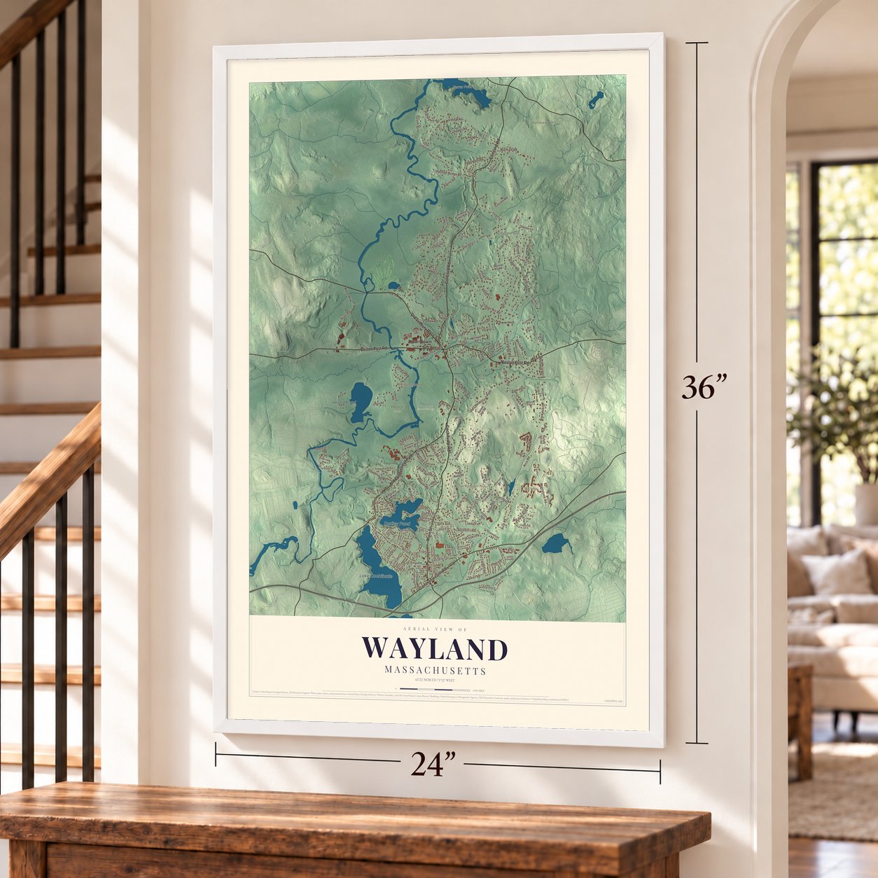 Wayland, Massachusetts map, 24 x 36 inch print in a white frame by a staircase