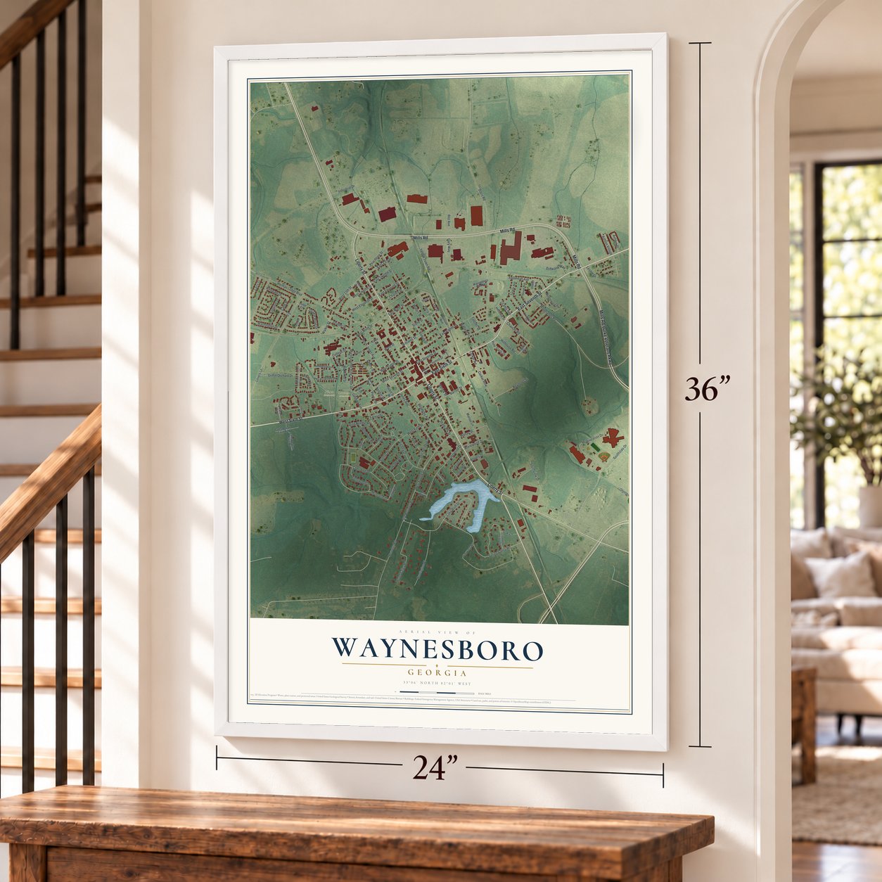Waynesboro, Georgia map, 24 x 36 inch print in a white frame by a staircase
