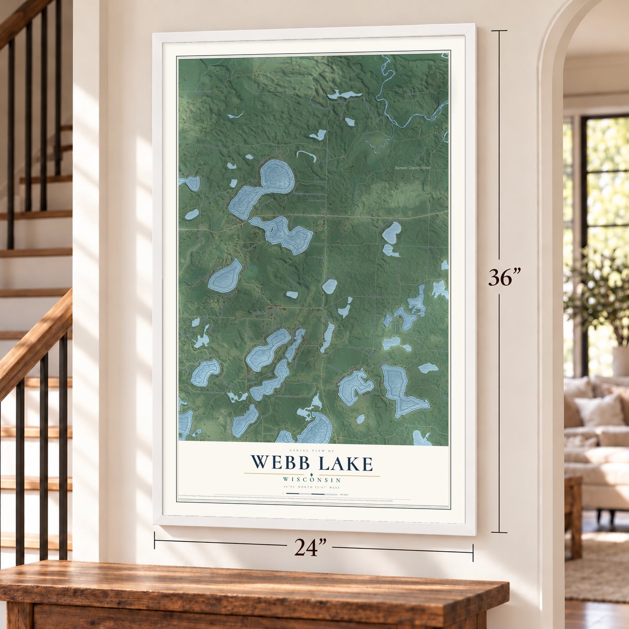 Webb Lake, Wisconsin map, 24 x 36 inch print in a white frame by a staircase