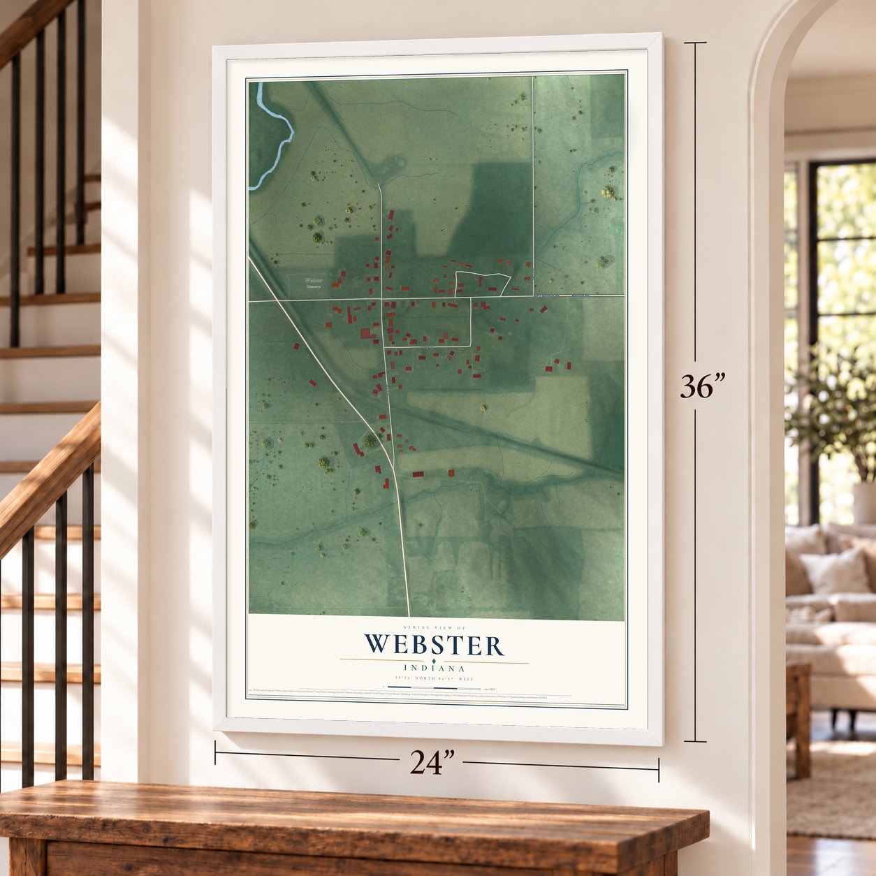 Webster, Indiana map, 24 x 36 inch print in a white frame by a staircase