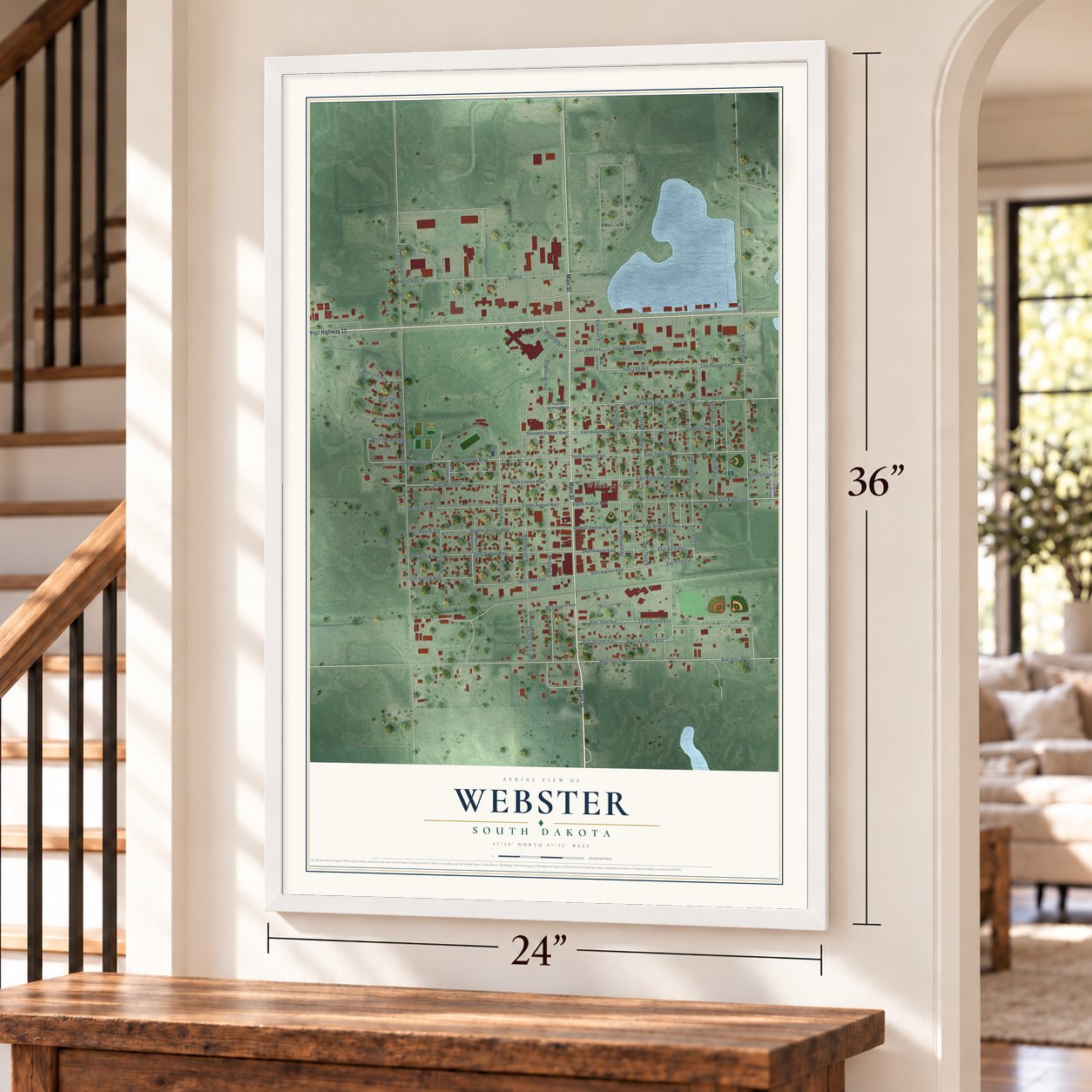 Webster, South Dakota map, 24 x 36 inch print in a white frame by a staircase