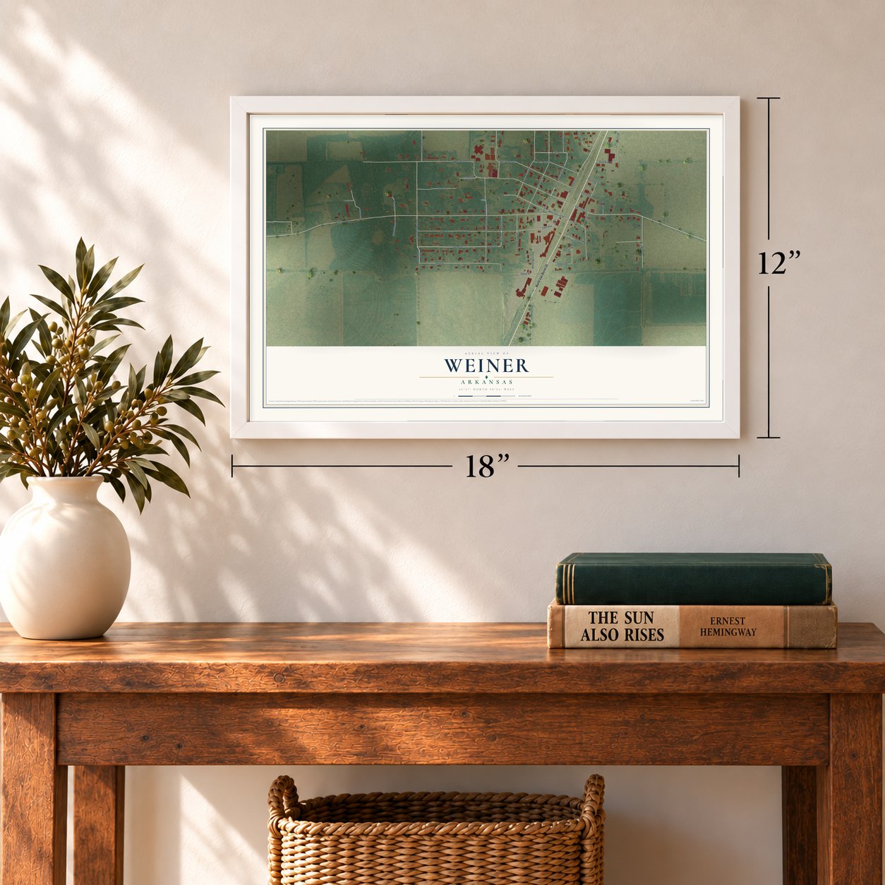Weiner, Arkansas map, 12 x 18 inch print in a white frame in an entryway