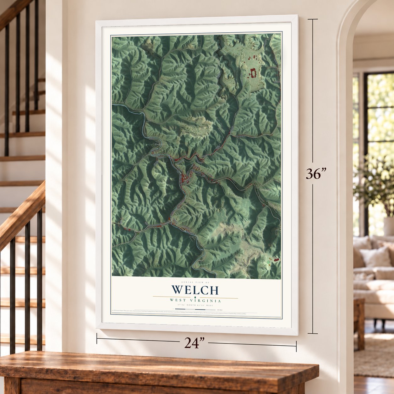 Welch, West Virginia map, 24 x 36 inch print in a white frame by a staircase