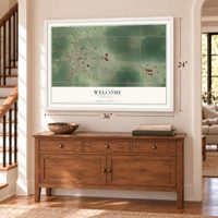Welcome, Minnesota map, 24 x 36 inch print in a white frame above a dresser by a staircase