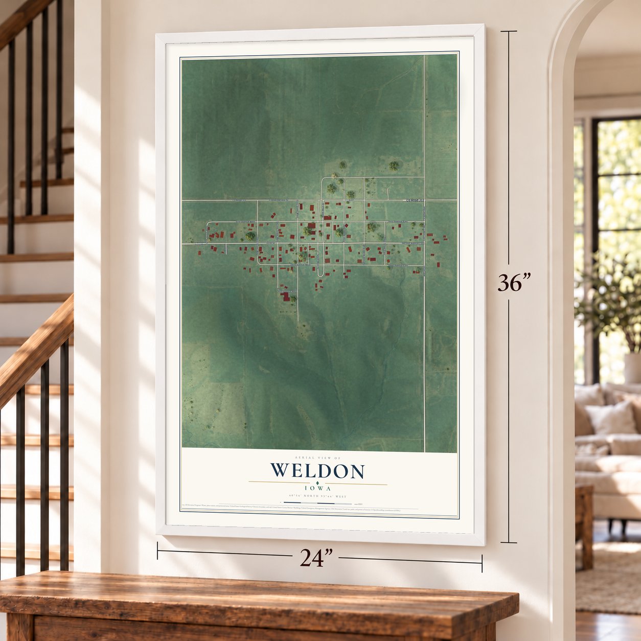 Weldon, Iowa map, 24 x 36 inch print in a white frame by a staircase