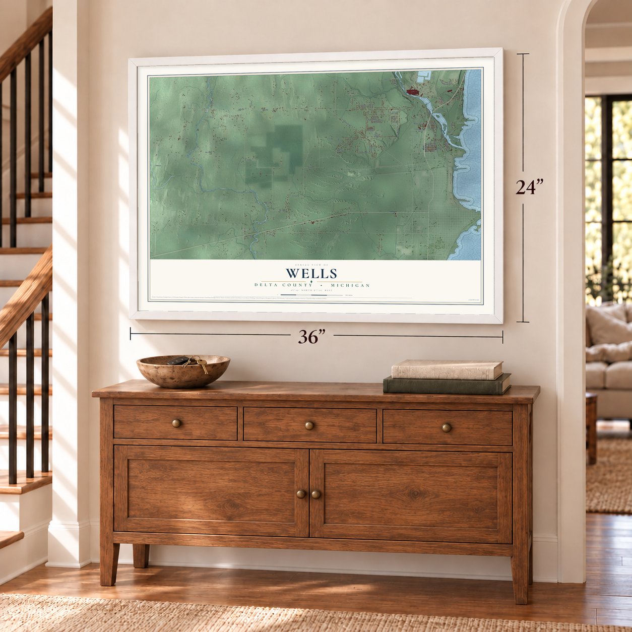 Wells, Delta County, Michigan map, 24 x 36 inch print in a white frame above a dresser by a staircase