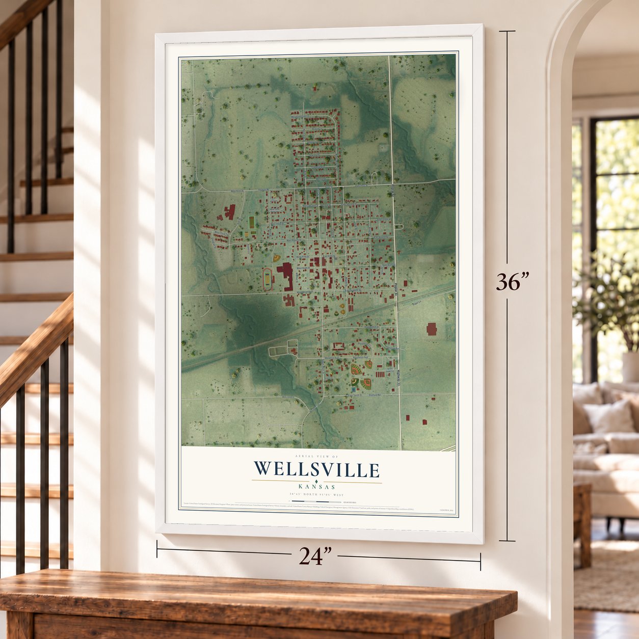Wellsville, Kansas map, 24 x 36 inch print in a white frame by a staircase
