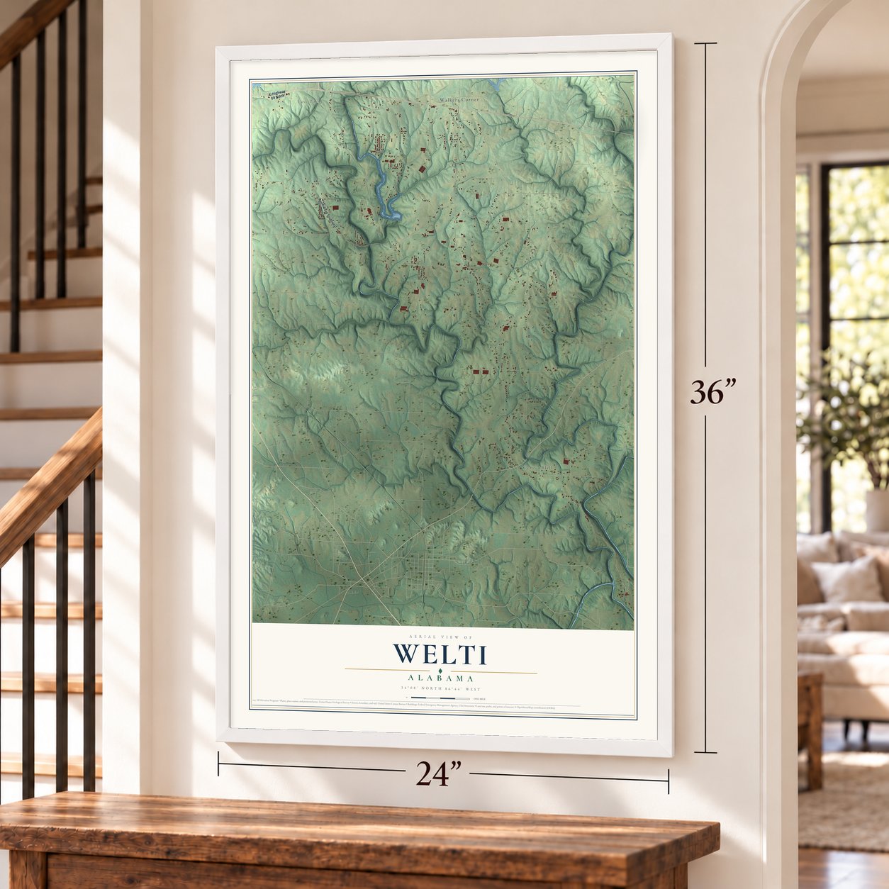 Welti, Alabama map, 24 x 36 inch print in a white frame by a staircase