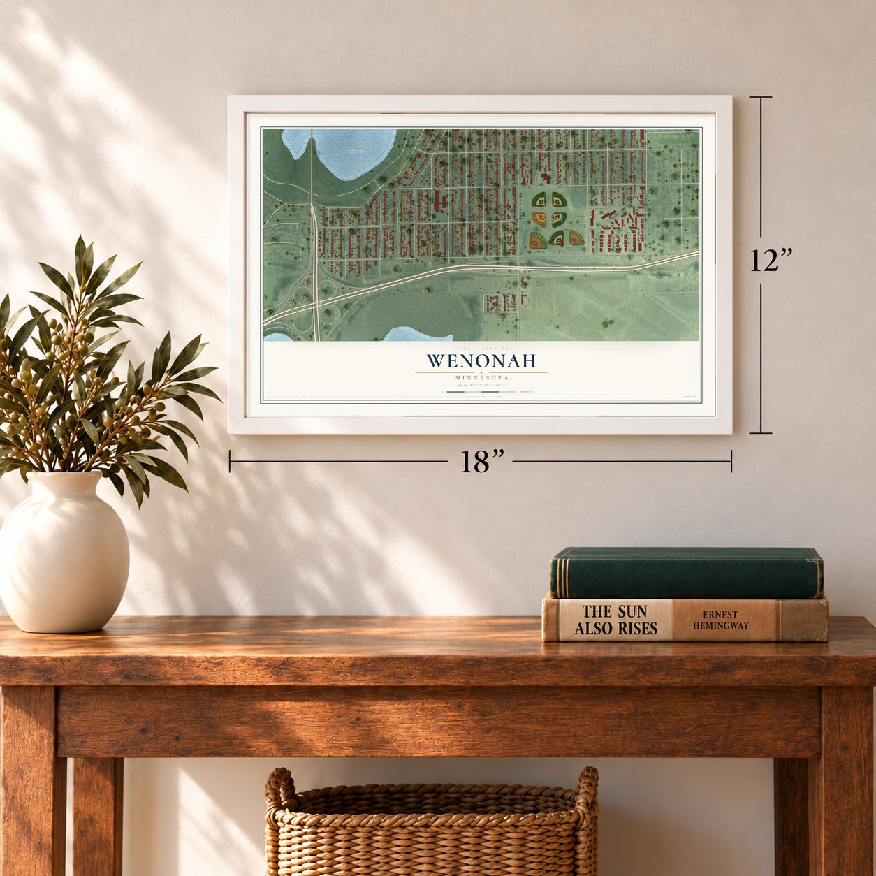 Wenonah, Minnesota map, 12 x 18 inch print in a white frame in an entryway