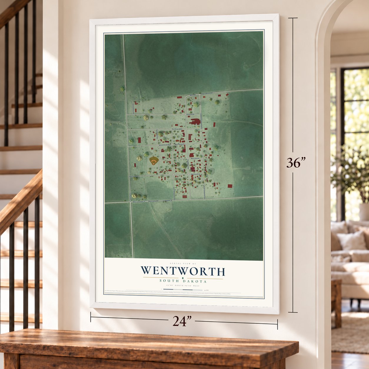Wentworth, South Dakota map, 24 x 36 inch print in a white frame by a staircase