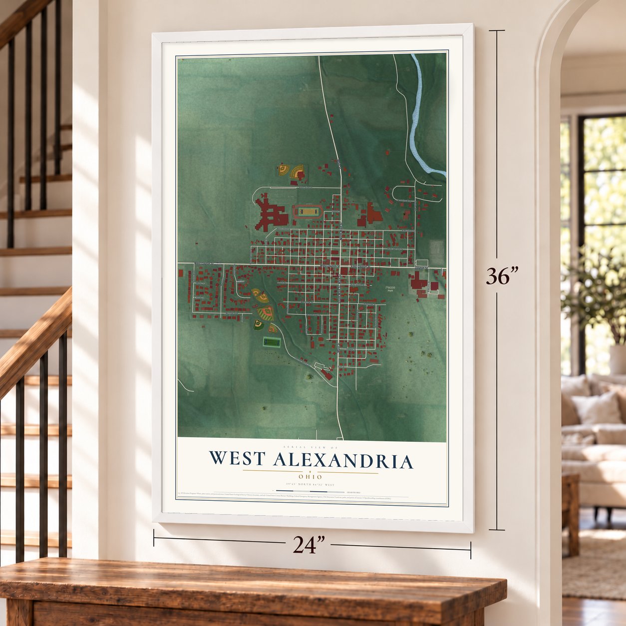 West Alexandria, Ohio map, 24 x 36 inch print in a white frame by a staircase