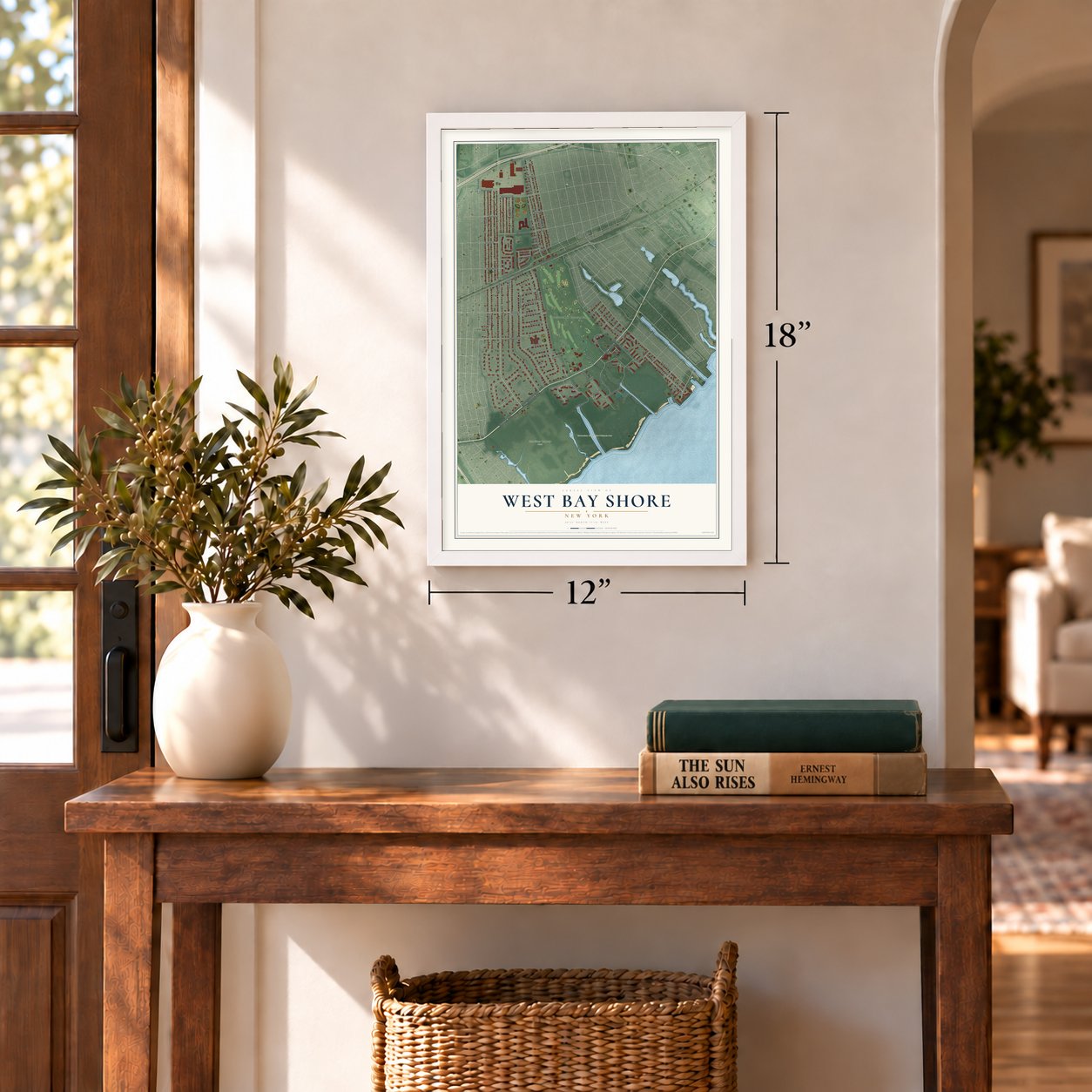 West Bay Shore, New York map, 12 x 18 inch print in a white frame in an entryway