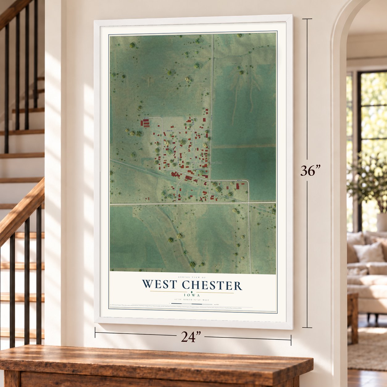 West Chester, Iowa map, 24 x 36 inch print in a white frame by a staircase