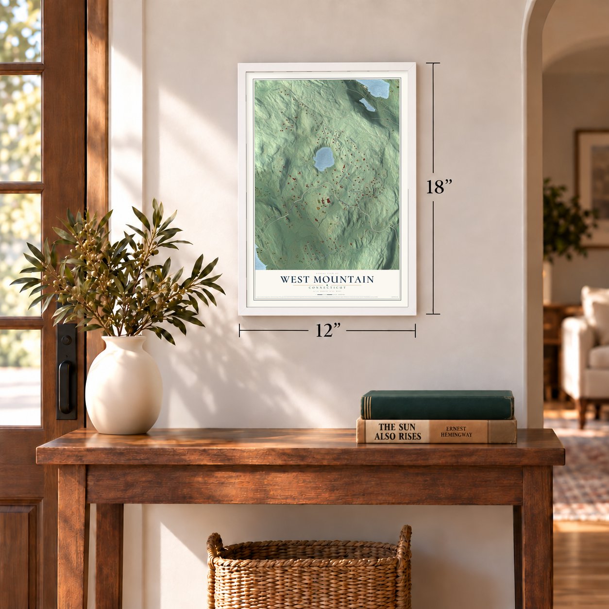 West Mountain, Connecticut map, 12 x 18 inch print in a white frame in an entryway