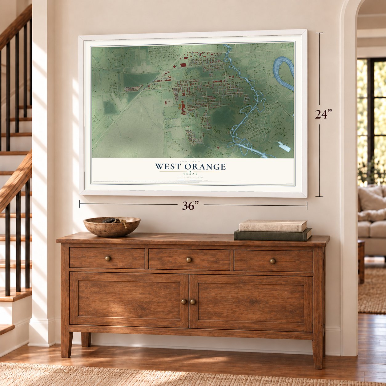 West Orange, Texas map, 24 x 36 inch print in a white frame above a dresser by a staircase