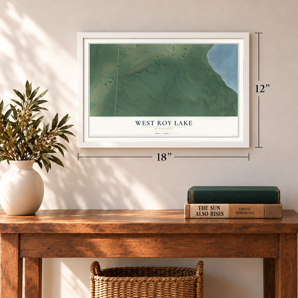 West Roy Lake, Minnesota map, 12 x 18 inch print in a white frame in an entryway