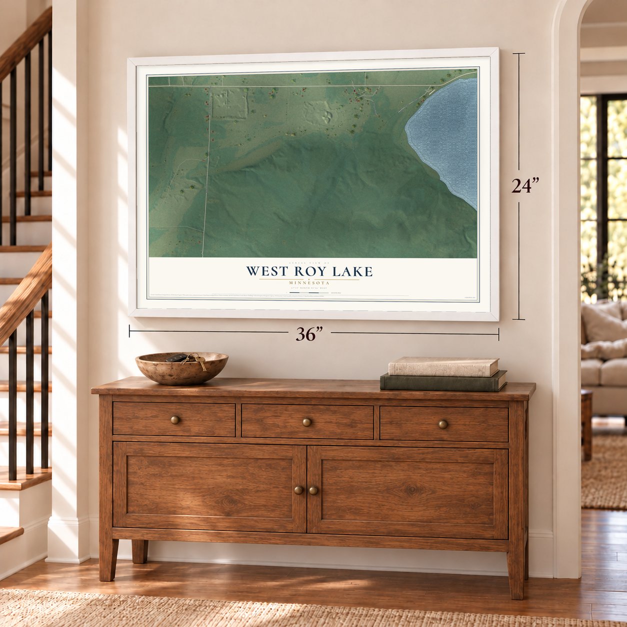 West Roy Lake, Minnesota map, 24 x 36 inch print in a white frame above a dresser by a staircase