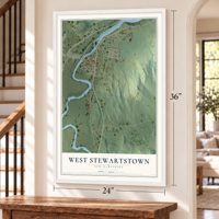 West Stewartstown, New Hampshire map, 24 x 36 inch print in a white frame by a staircase