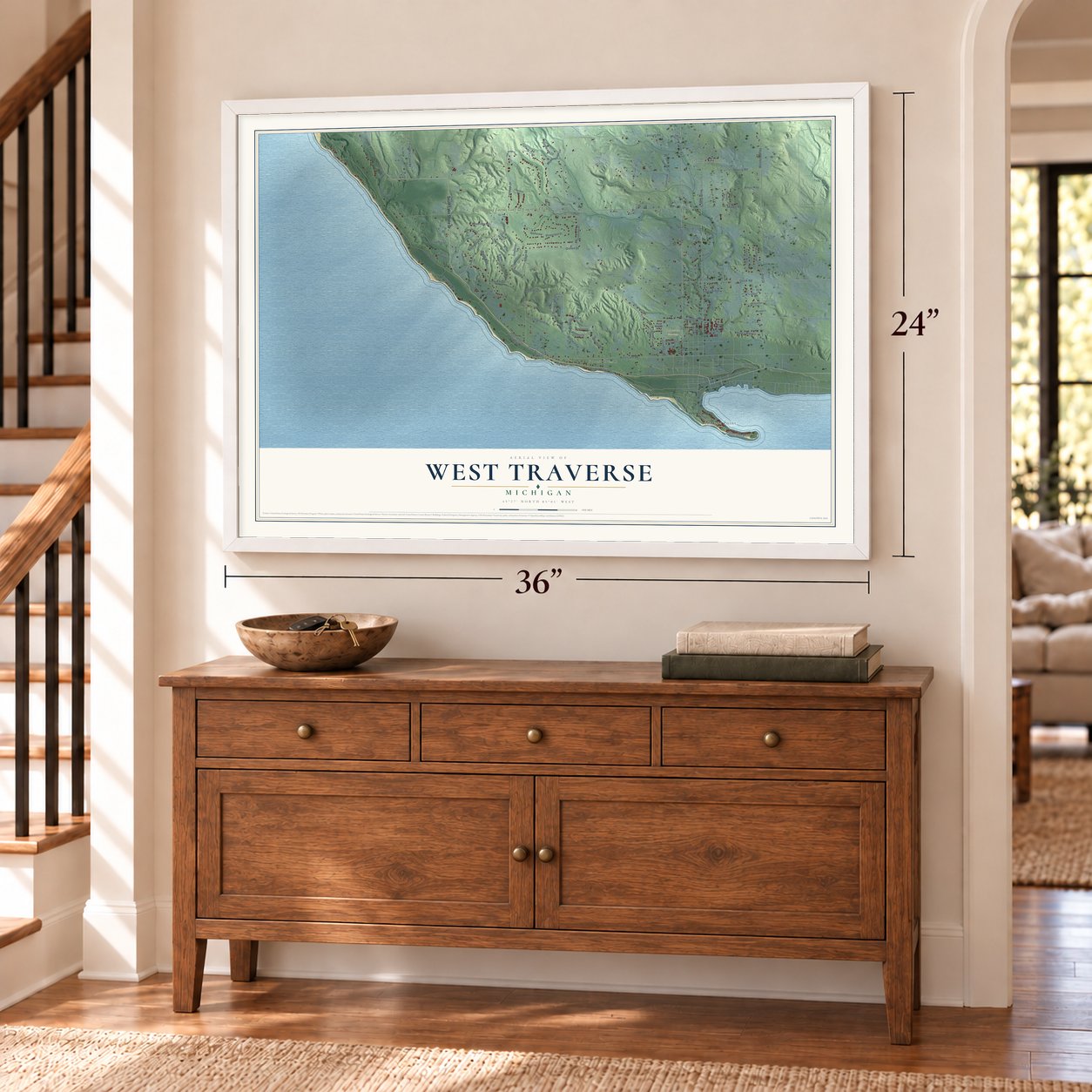 West Traverse, Michigan map, 24 x 36 inch print in a white frame above a dresser by a staircase