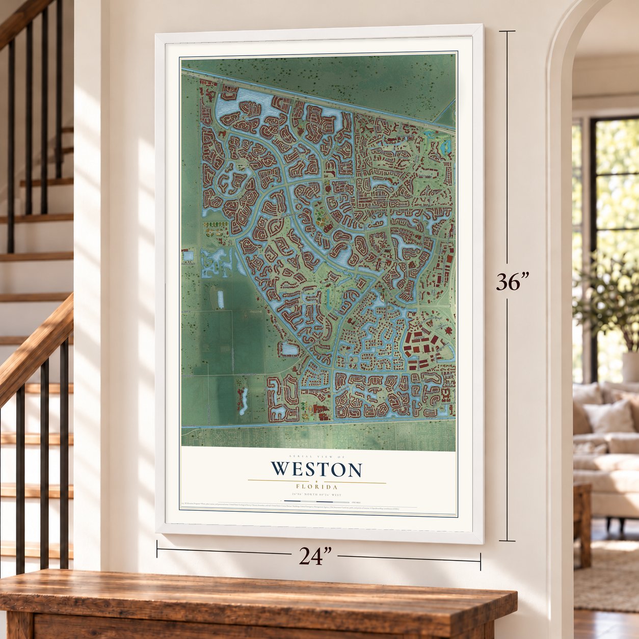 Weston, Florida map, 24 x 36 inch print in a white frame by a staircase
