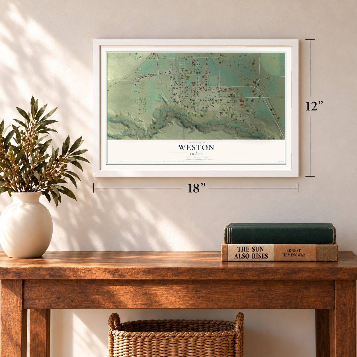 Weston, Idaho map, 12 x 18 inch print in a white frame in an entryway