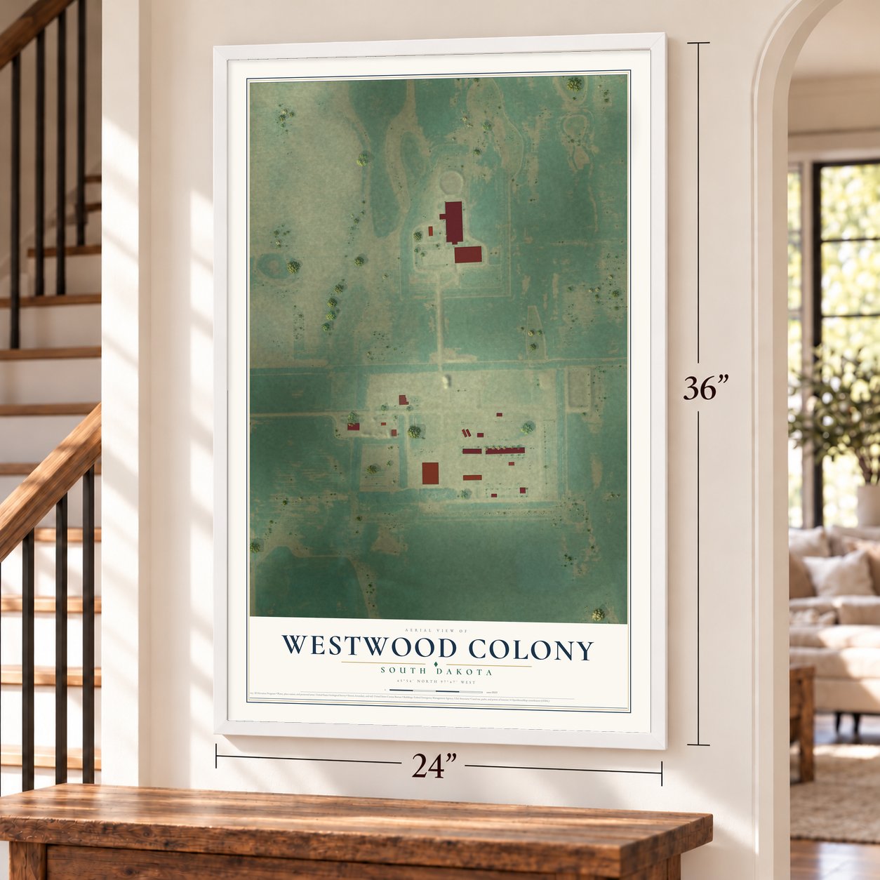Westwood Colony, South Dakota map, 24 x 36 inch print in a white frame by a staircase