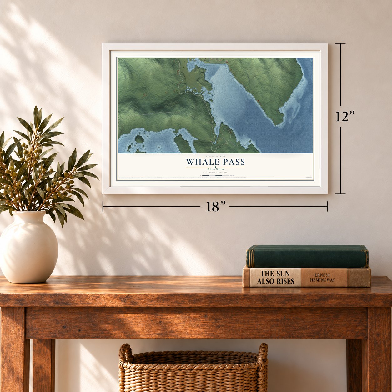 Whale Pass, Alaska map, 12 x 18 inch print in a white frame in an entryway