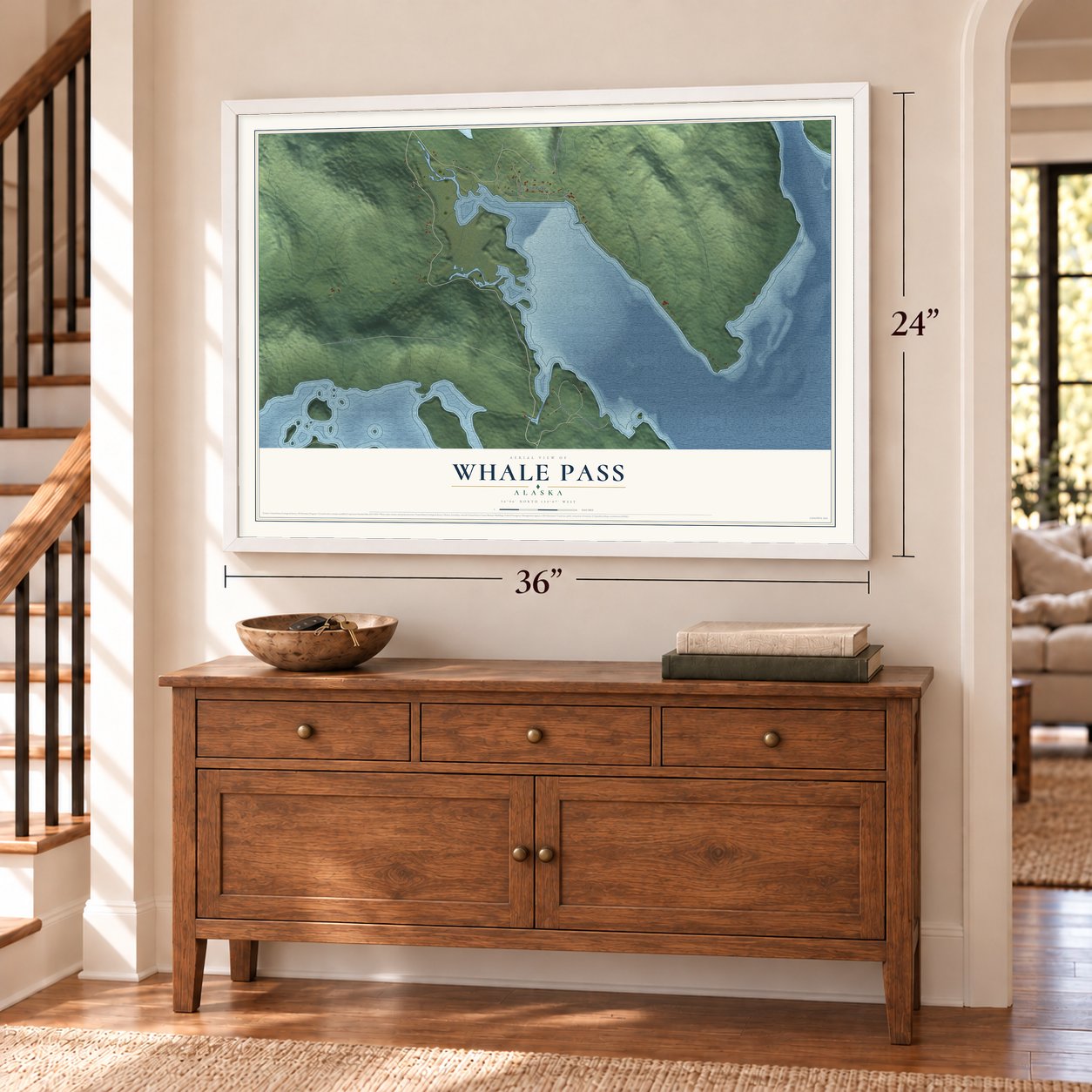 Whale Pass, Alaska map, 24 x 36 inch print in a white frame above a dresser by a staircase
