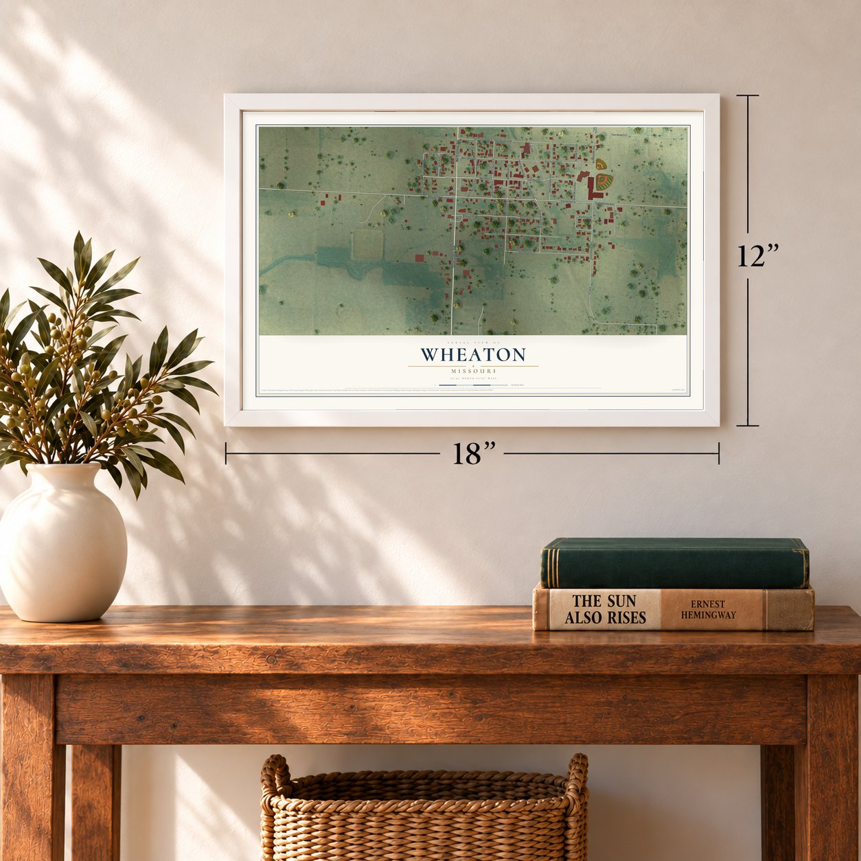 Wheaton, Missouri map, 12 x 18 inch print in a white frame in an entryway