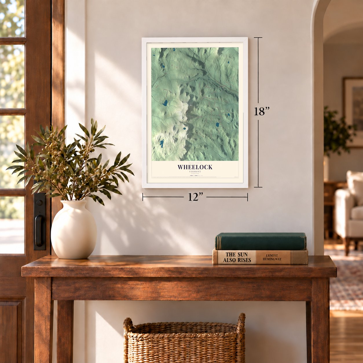 Wheelock, Vermont map, 12 x 18 inch print in a white frame in an entryway