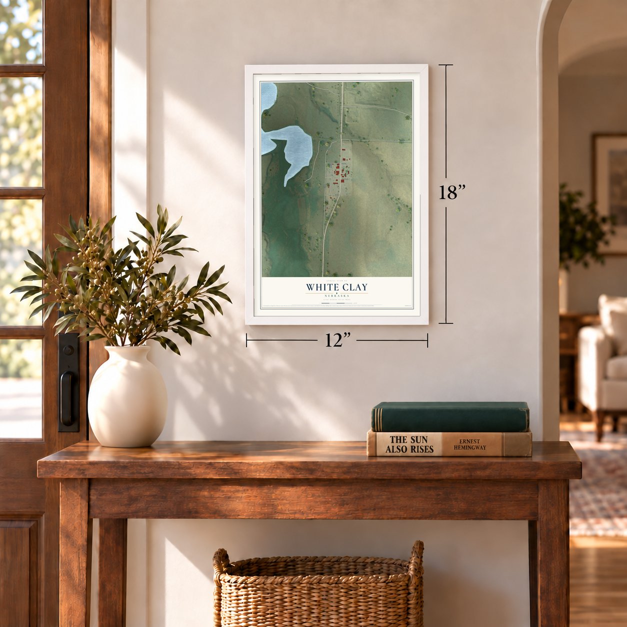White Clay, Nebraska map, 12 x 18 inch print in a white frame in an entryway