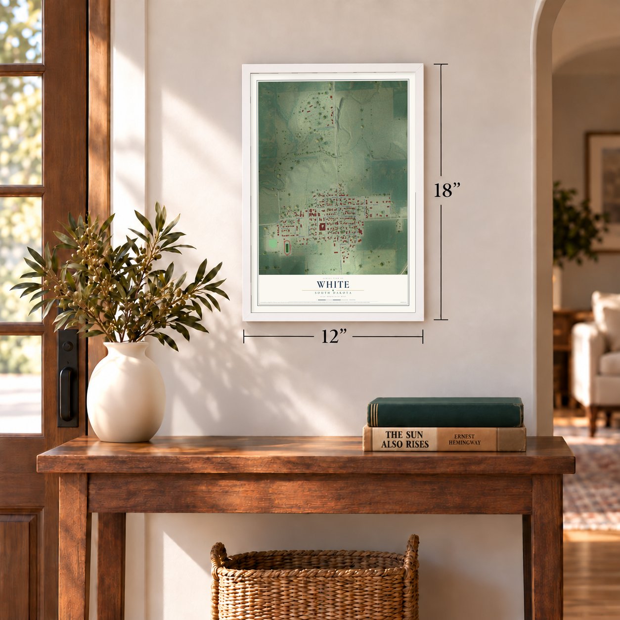White, South Dakota map, 12 x 18 inch print in a white frame in an entryway