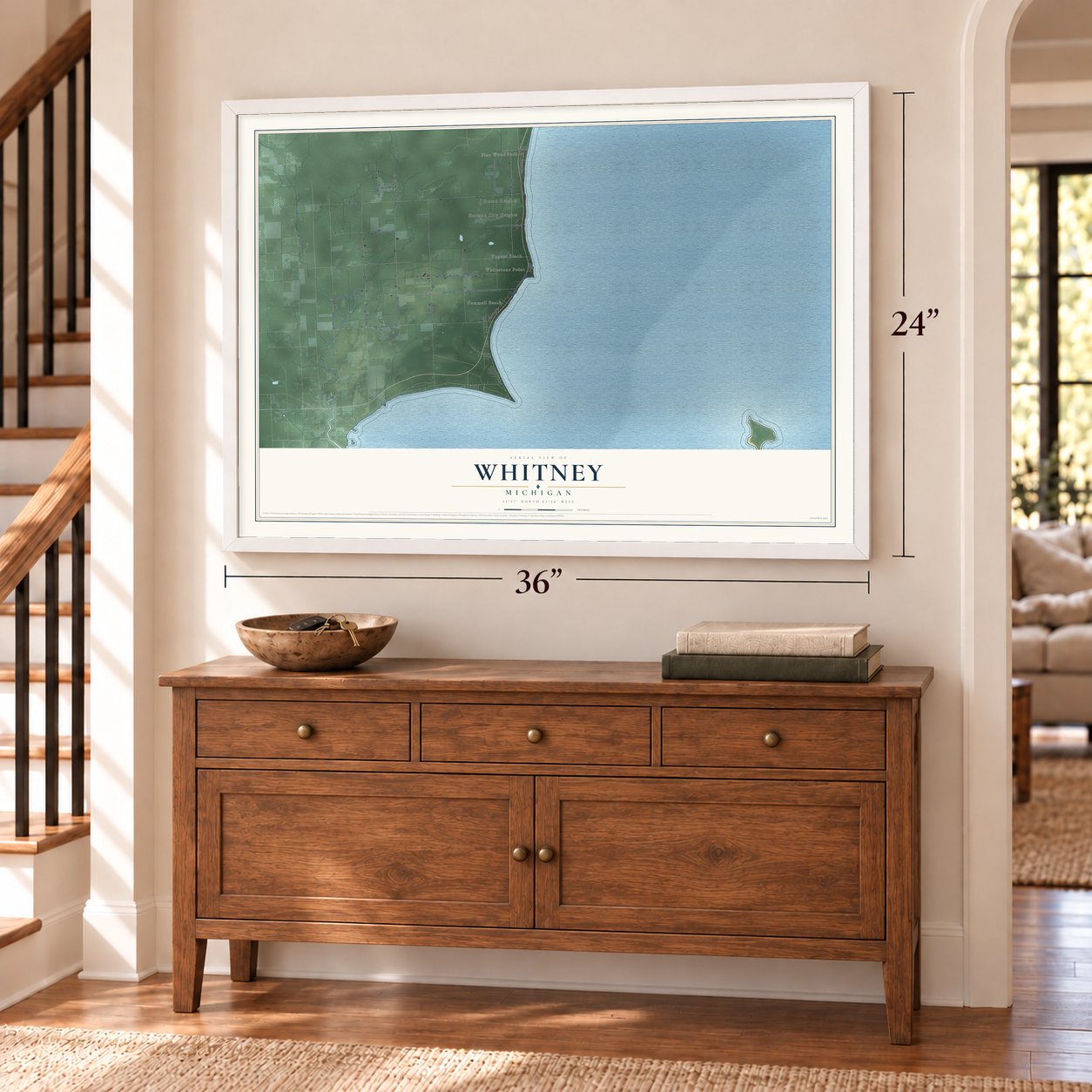 Whitney, Michigan map, 24 x 36 inch print in a white frame above a dresser by a staircase