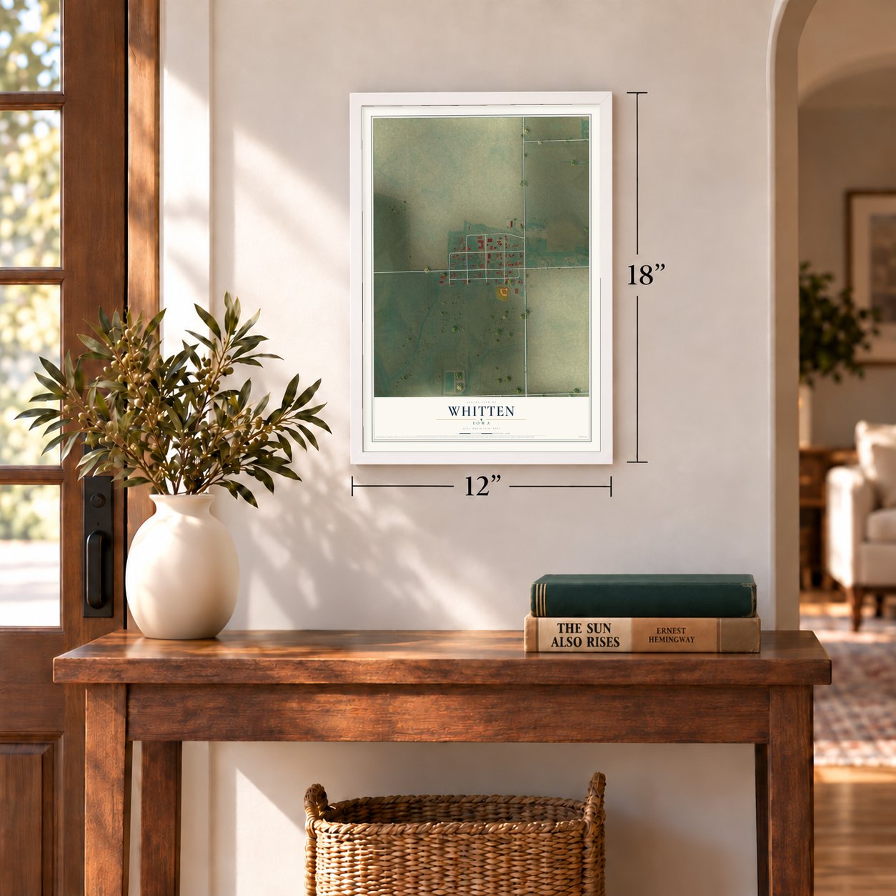 Whitten, Iowa map, 12 x 18 inch print in a white frame in an entryway