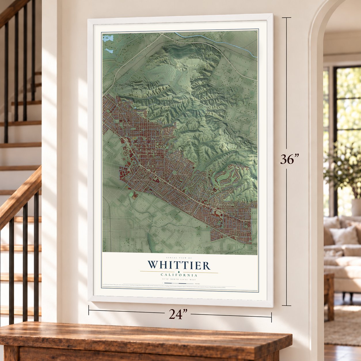 Whittier, California map, 24 x 36 inch print in a white frame by a staircase
