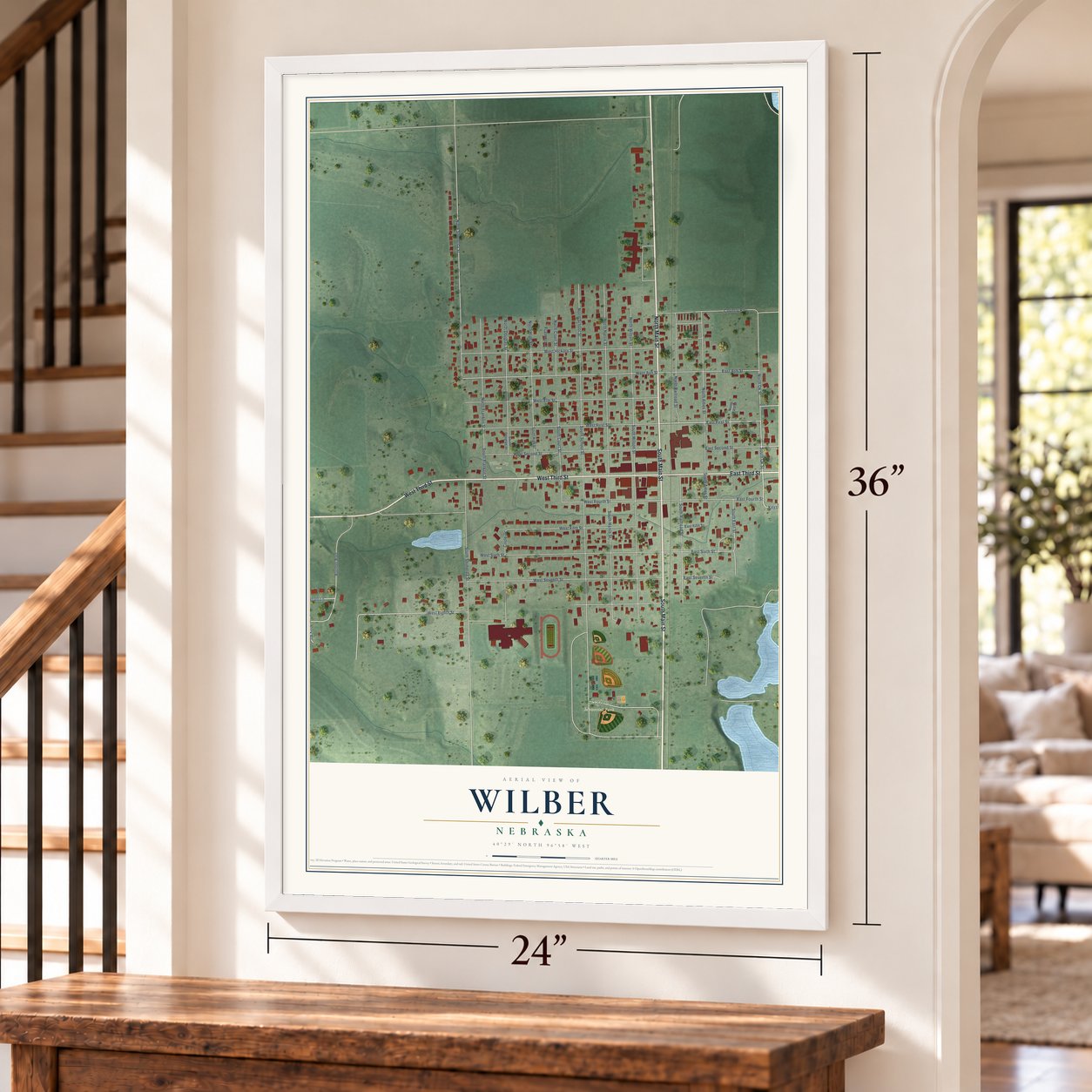 Wilber, Nebraska map, 24 x 36 inch print in a white frame by a staircase