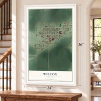Wilcox, Nebraska map, 24 x 36 inch print in a white frame by a staircase