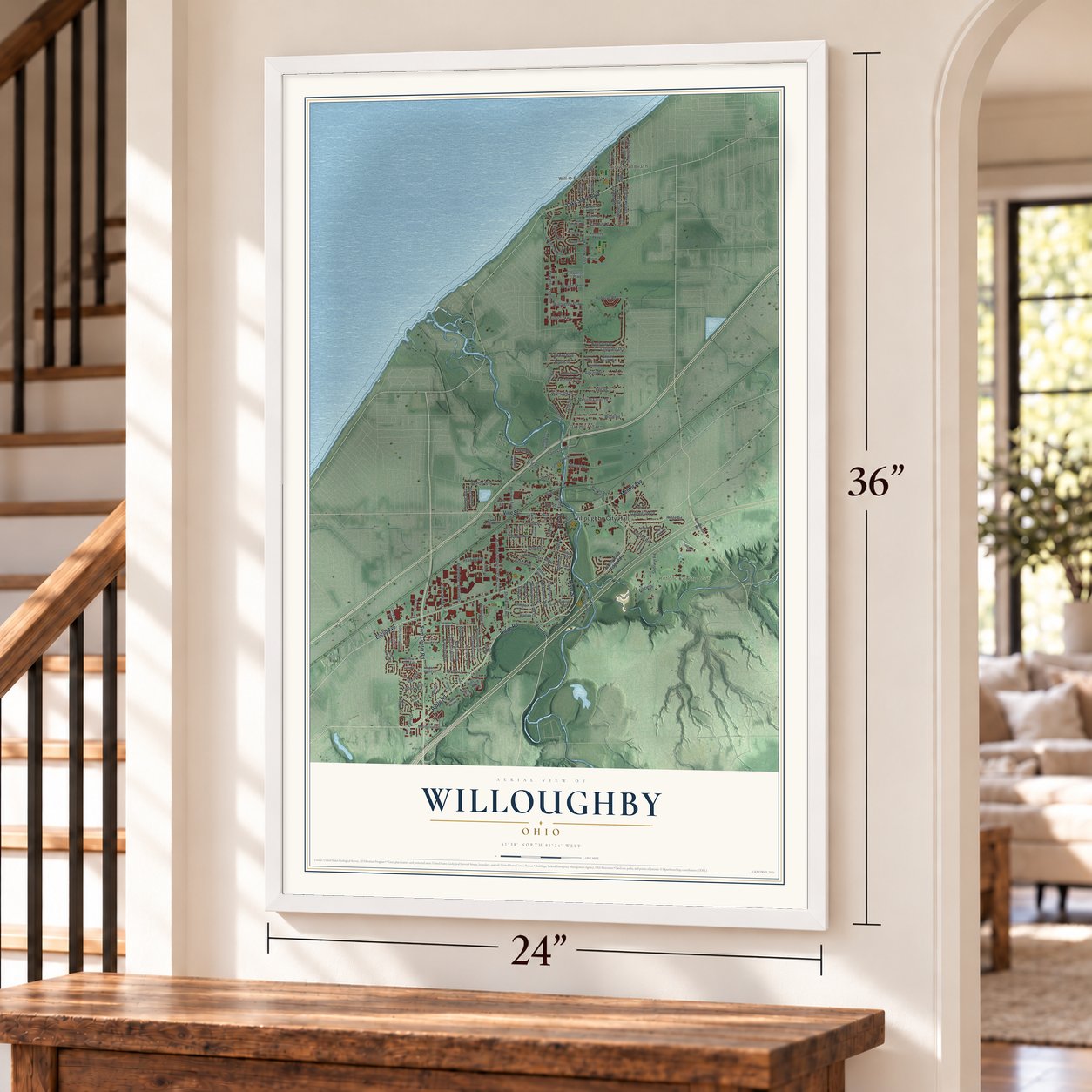 Willoughby, Ohio map, 24 x 36 inch print in a white frame by a staircase