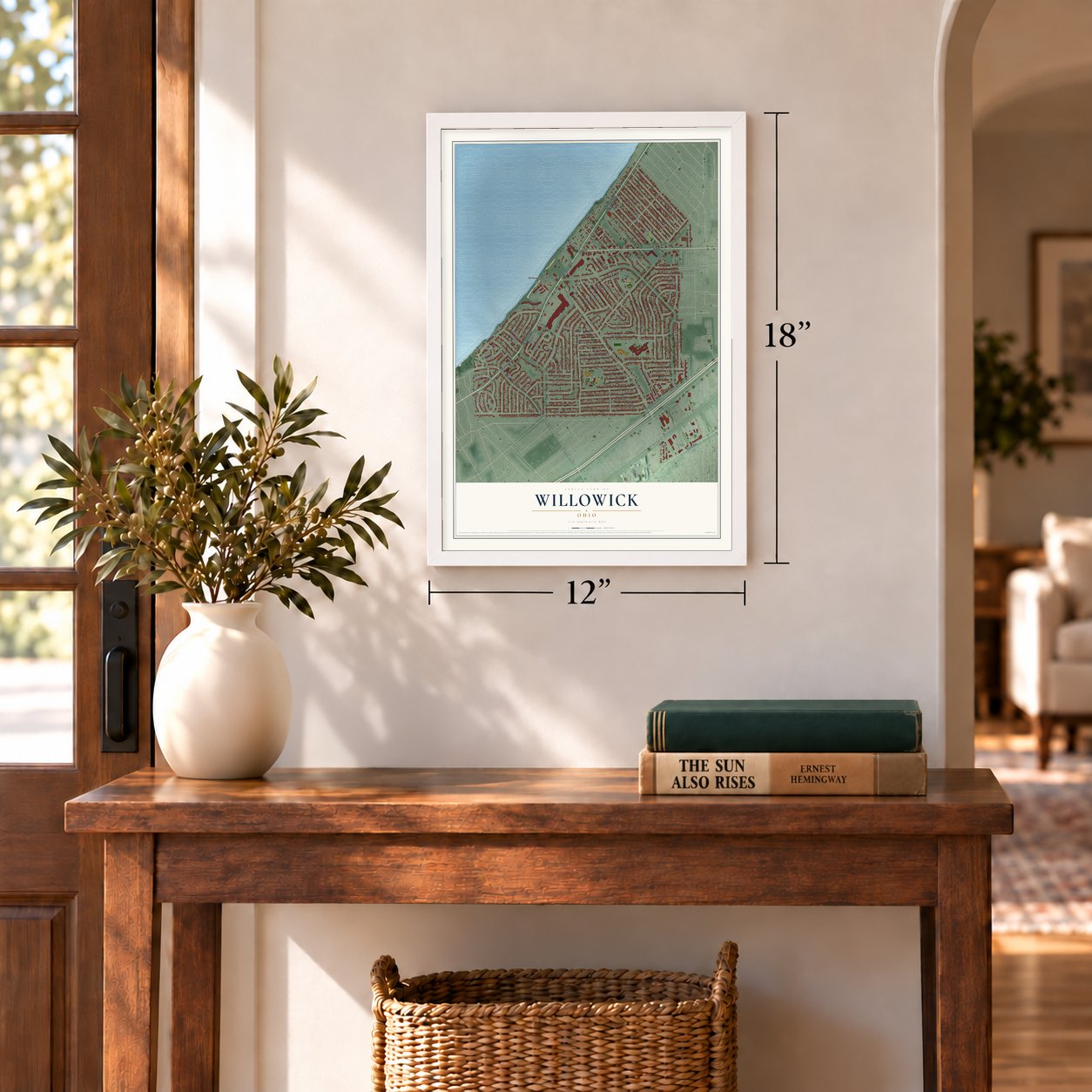 Willowick, Ohio map, 12 x 18 inch print in a white frame in an entryway