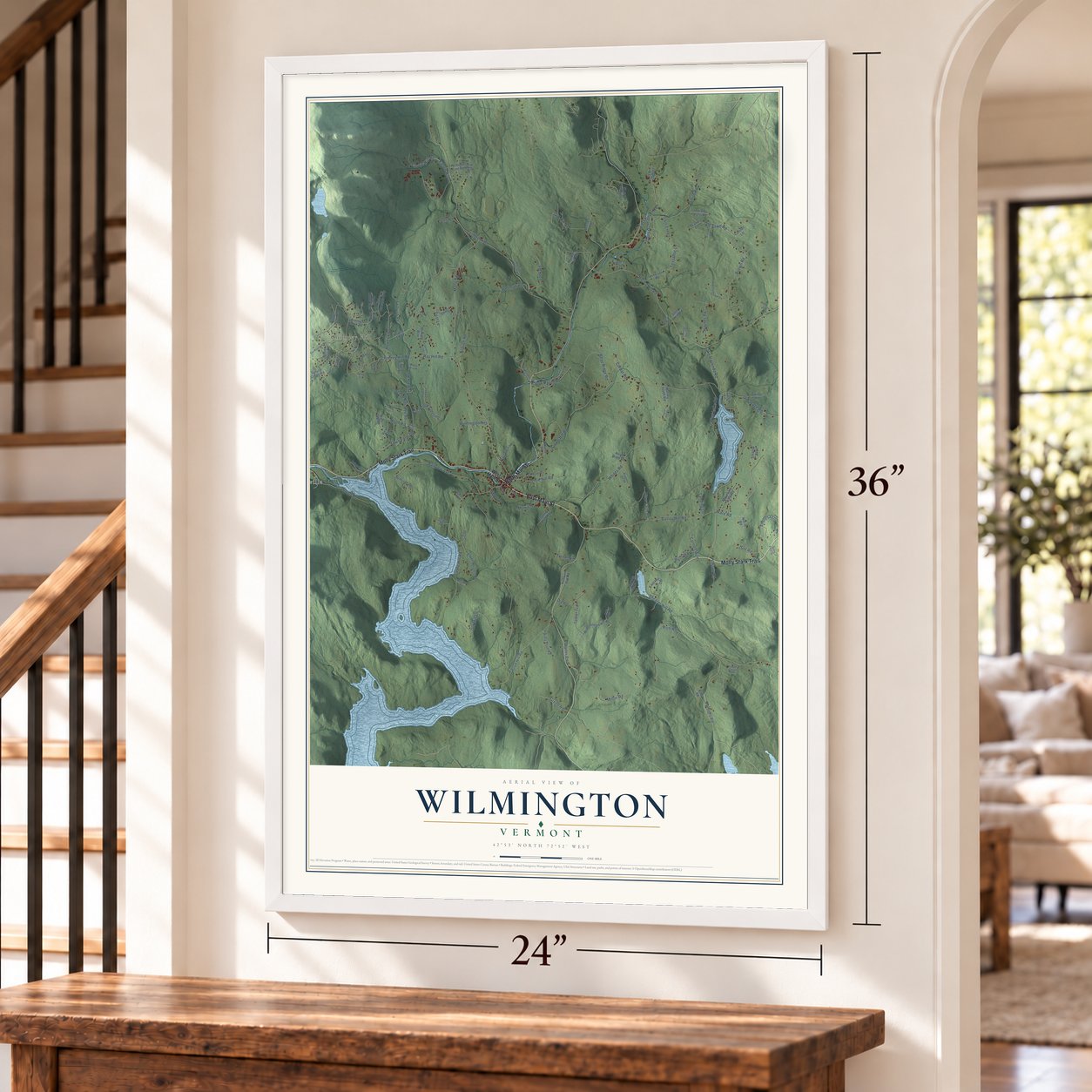 Wilmington, Vermont map, 24 x 36 inch print in a white frame by a staircase