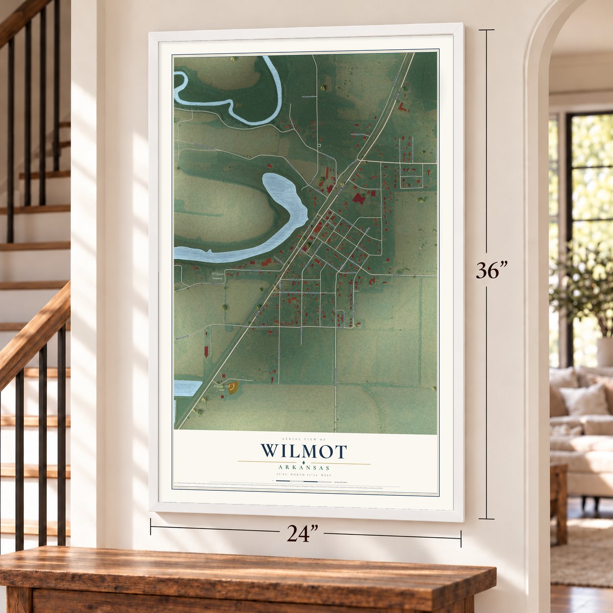 Wilmot, Arkansas map, 24 x 36 inch print in a white frame by a staircase