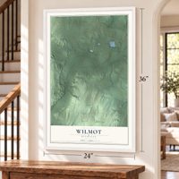 Wilmot, Michigan map, 24 x 36 inch print in a white frame by a staircase