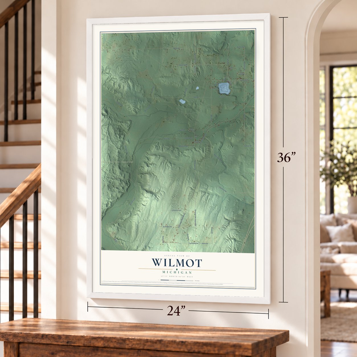 Wilmot, Michigan map, 24 x 36 inch print in a white frame by a staircase