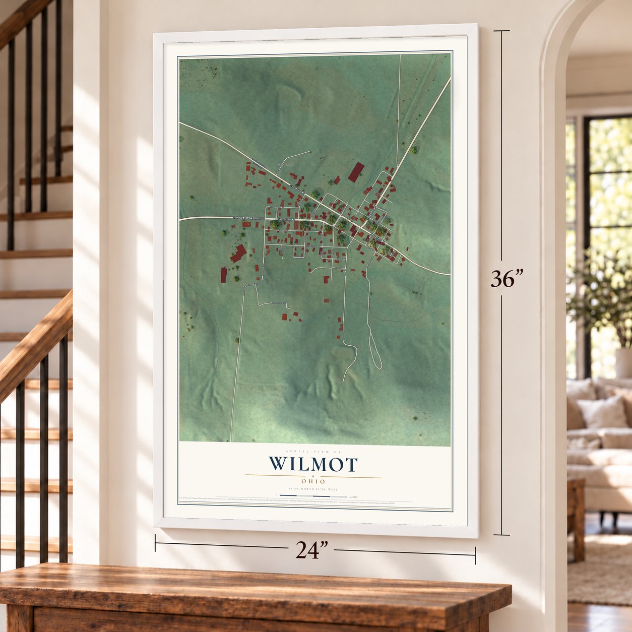 Wilmot, Ohio map, 24 x 36 inch print in a white frame by a staircase