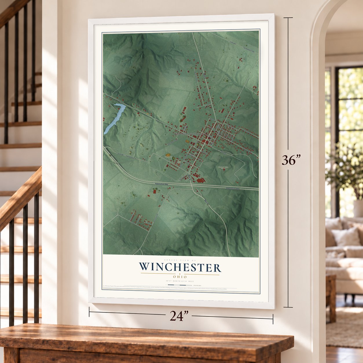 Winchester, Ohio map, 24 x 36 inch print in a white frame by a staircase