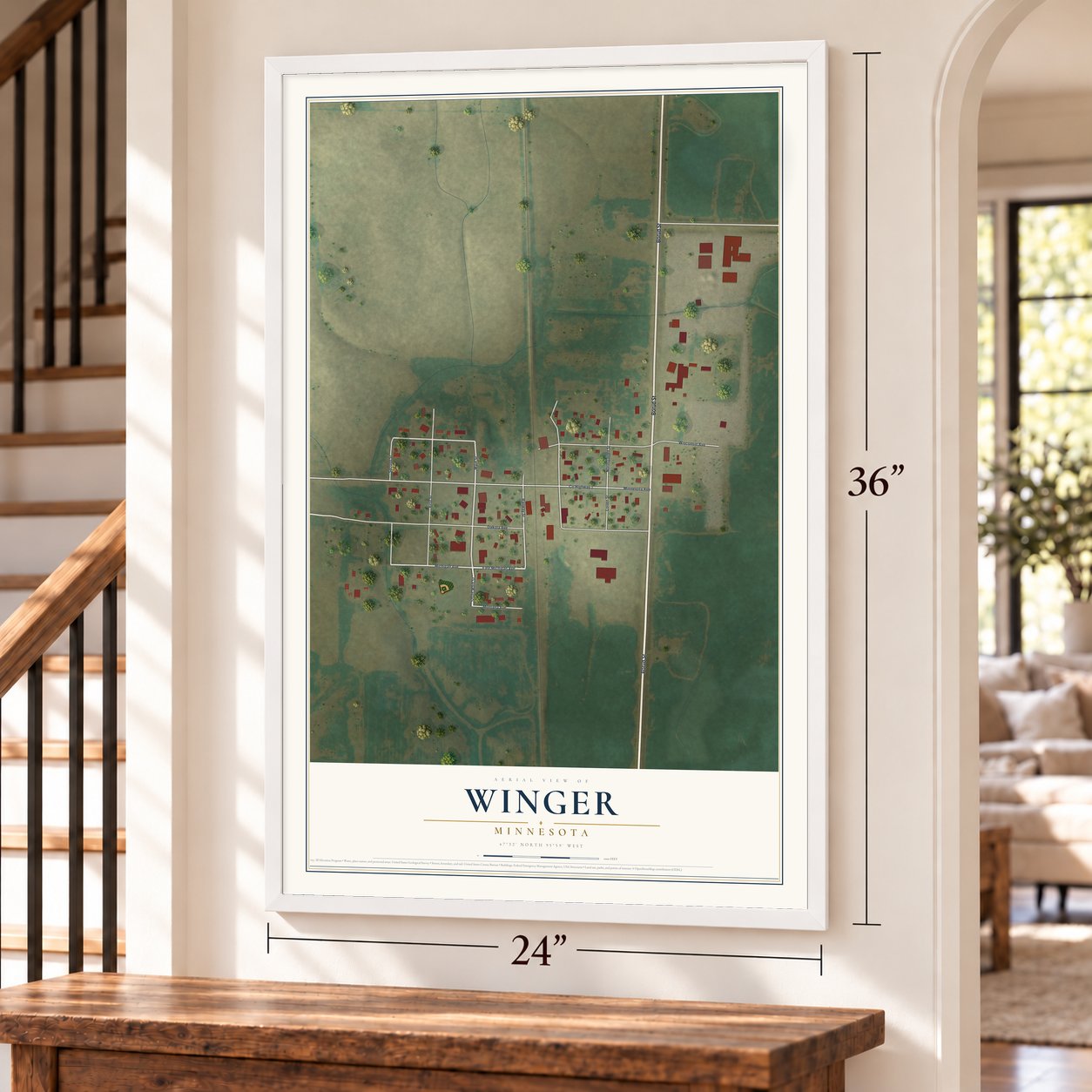 Winger, Minnesota map, 24 x 36 inch print in a white frame by a staircase