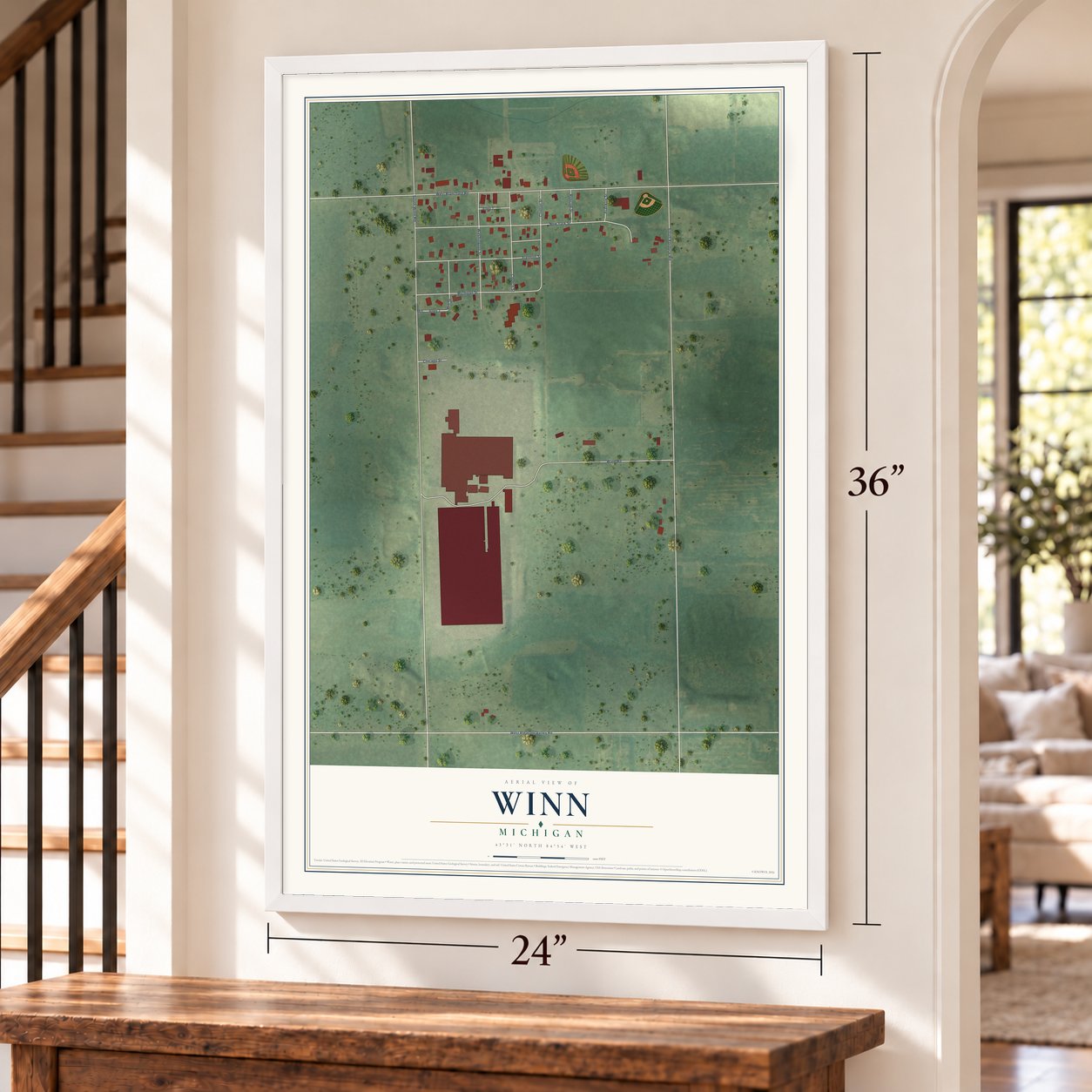 Winn, Michigan map, 24 x 36 inch print in a white frame by a staircase