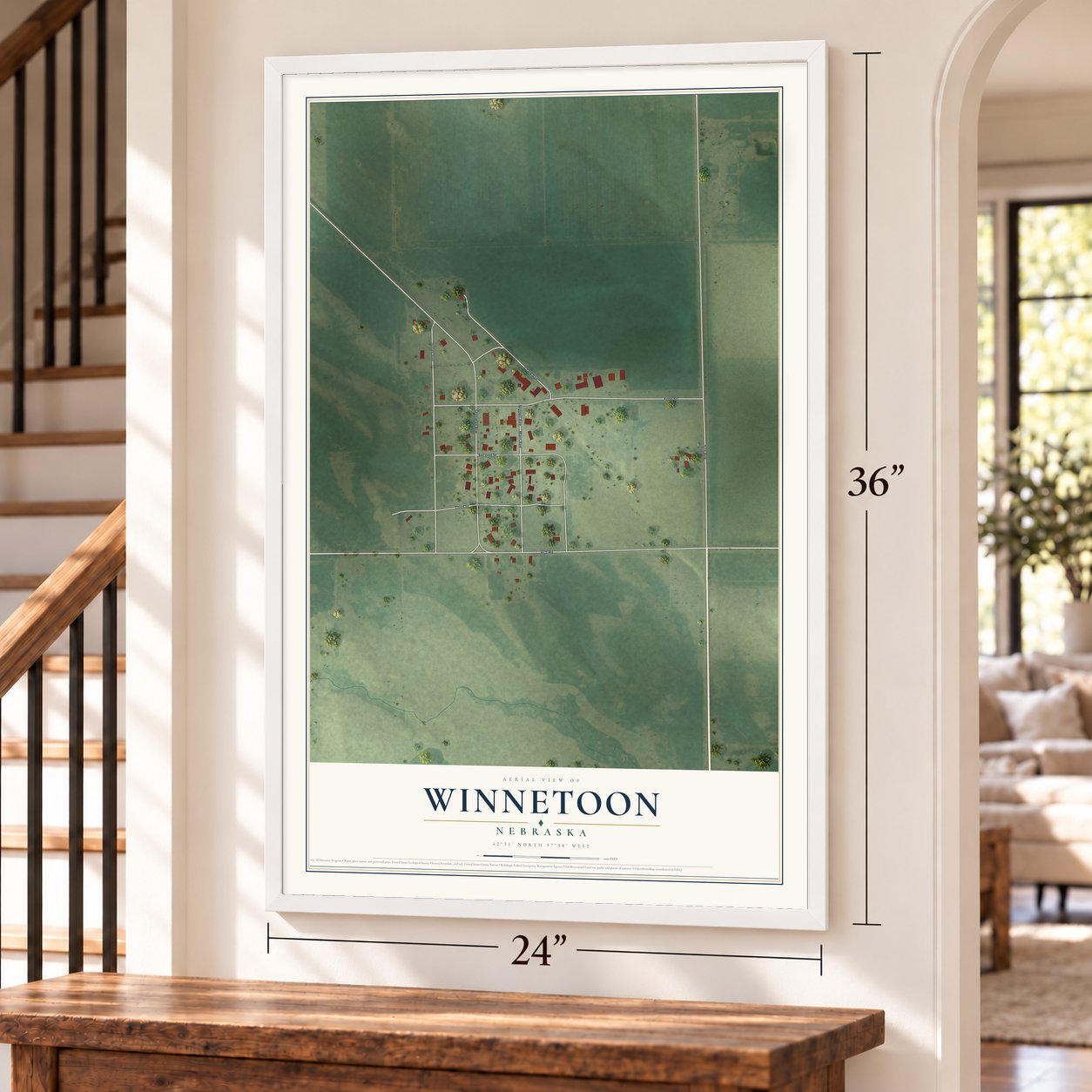 Winnetoon, Nebraska map, 24 x 36 inch print in a white frame by a staircase