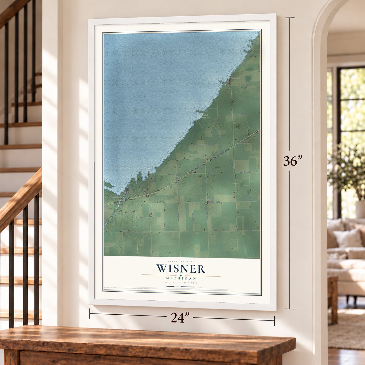 Wisner, Michigan map, 24 x 36 inch print in a white frame by a staircase